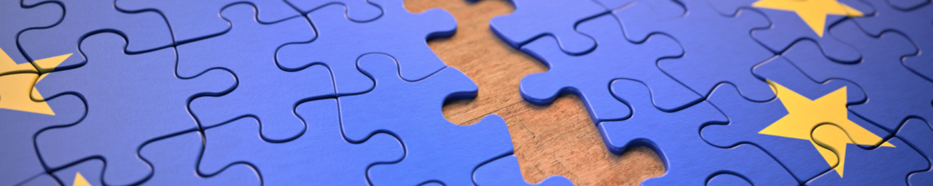A puzzle of the EU flag with pieces missing