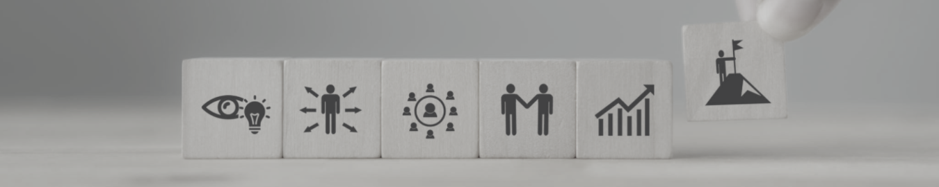 Four icons on white blocks representing different line of business in a corporation