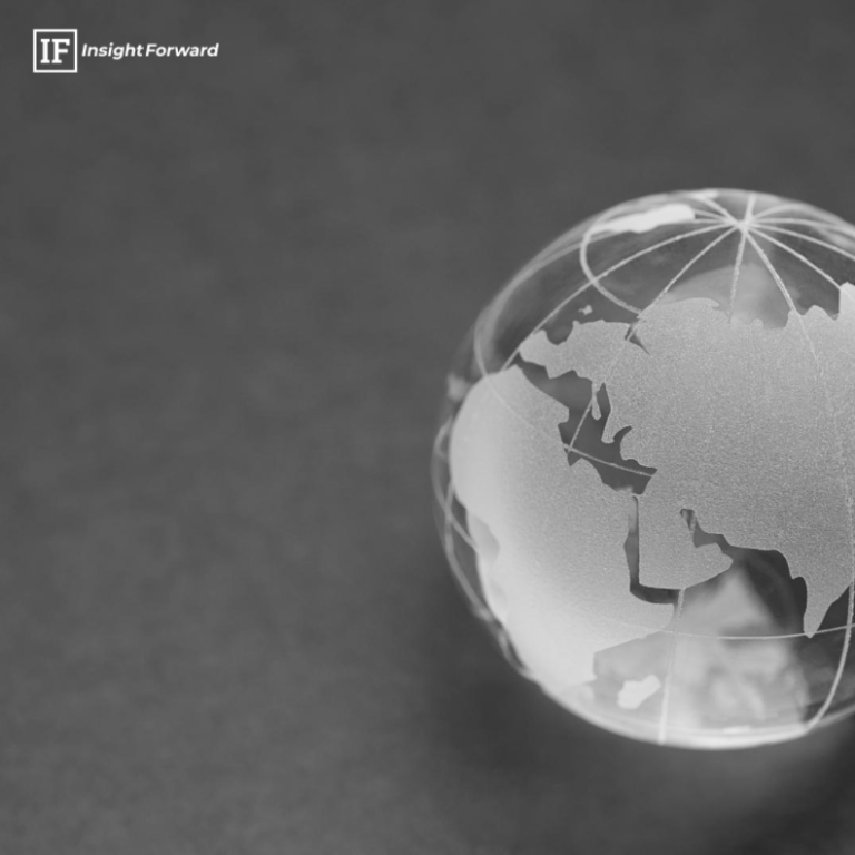 Transparent globe with outlined continents on a dark background.